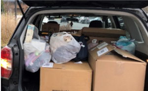image of donated gifts in the back of a vehicle