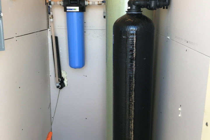 Off-Site Drinking Water Treatment system which includes two large tanks and one filter.nt