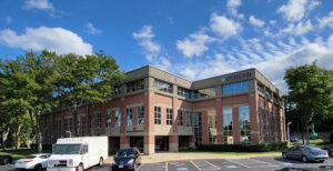 Exterior view of multi-story office building housing EA's Warwick Rhode Island location