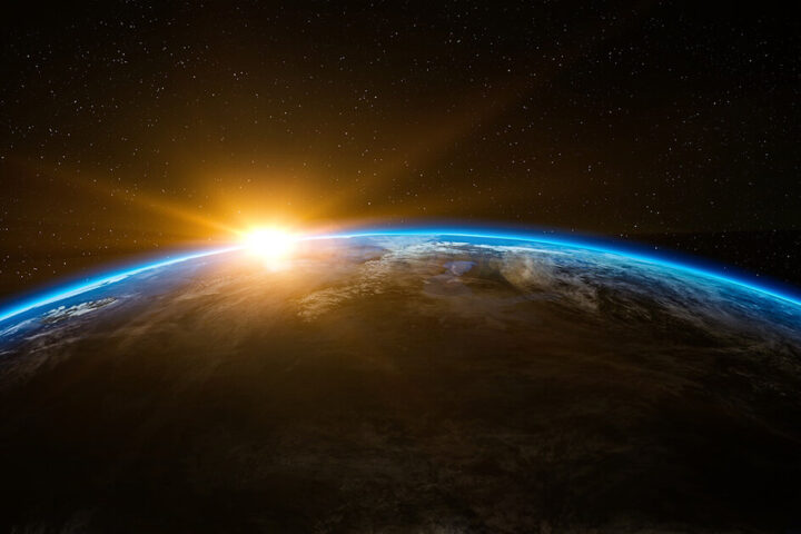 Stock photo Image of the curvature of earth from space with the sun just rising