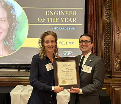 Ivy Harvey receives Engineer of the Year award from ACEC/MD Executive Director Chad Faison