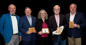 Grant Ferrier, Mike Battle, Sarah Ridgway, Ian MacFarlane, and Brian Lesinski at the EBI Environmental Industry Summit holding EA’s Business Achievement Awards