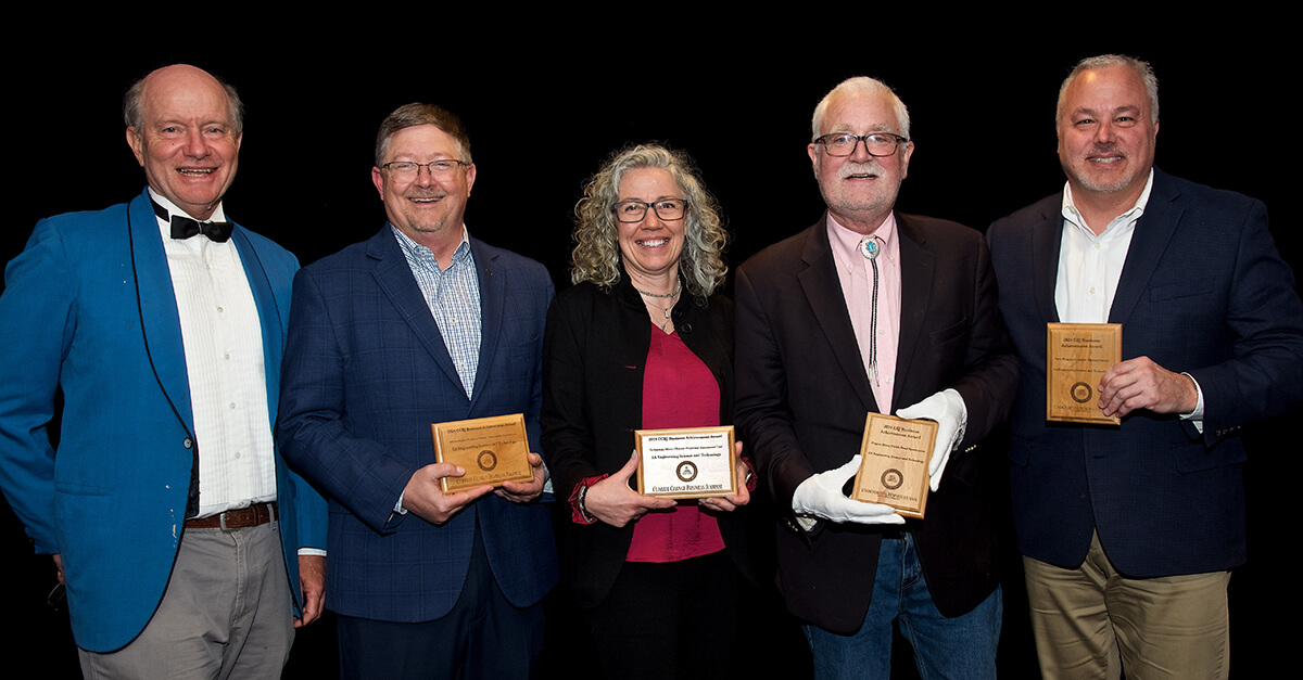 Grant Ferrier, Mike Battle, Sarah Ridgway, Ian MacFarlane, and Brian Lesinski at the EBI Environmental Industry Summit holding EA’s Business Achievement Awards