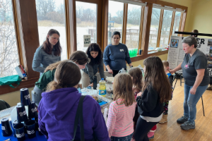 Image of Girl Scouts being taught at the 2025 SAME Buffalo post Day with an Engineer.