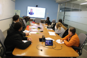 Image of students working on their findings for the Blue Swan Project.