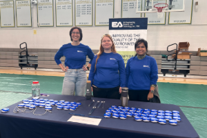 EA staff running a table at the Bryn Mawr school STEM career fair.